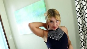 A blonde with blue eyes is sucking on a cock like a pro