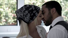 A blonde that loves big black cock is handling a thick pecker