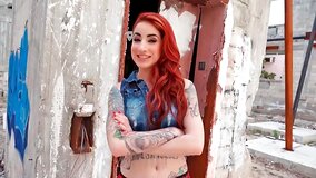 Redhead is having some sex while outside in a ruin
